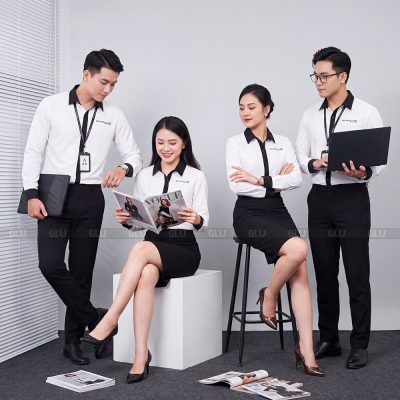 Đồng phục sơ mi nam nữ màu trắng phối đen nổi bật 1