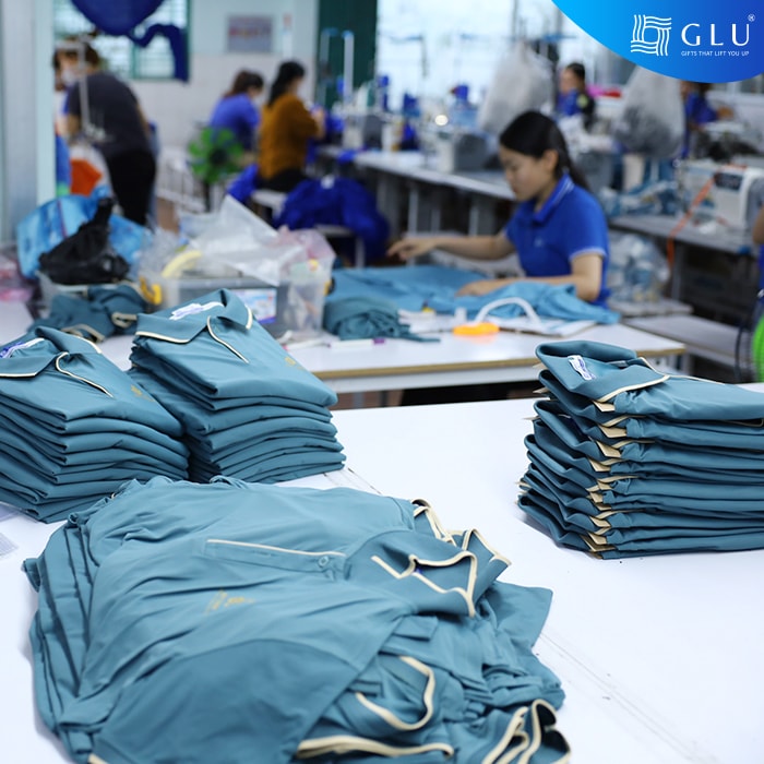 may đồng phục giá rẻ 7