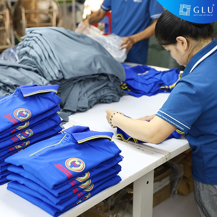xưởng may áo đồng phục polo công ty 21